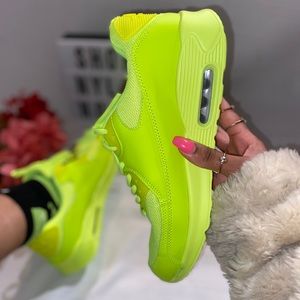 Neon green low top shoes
